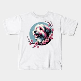 Joyful Lowchen Amidst Spring Cherry Blossoms Kids T-Shirt